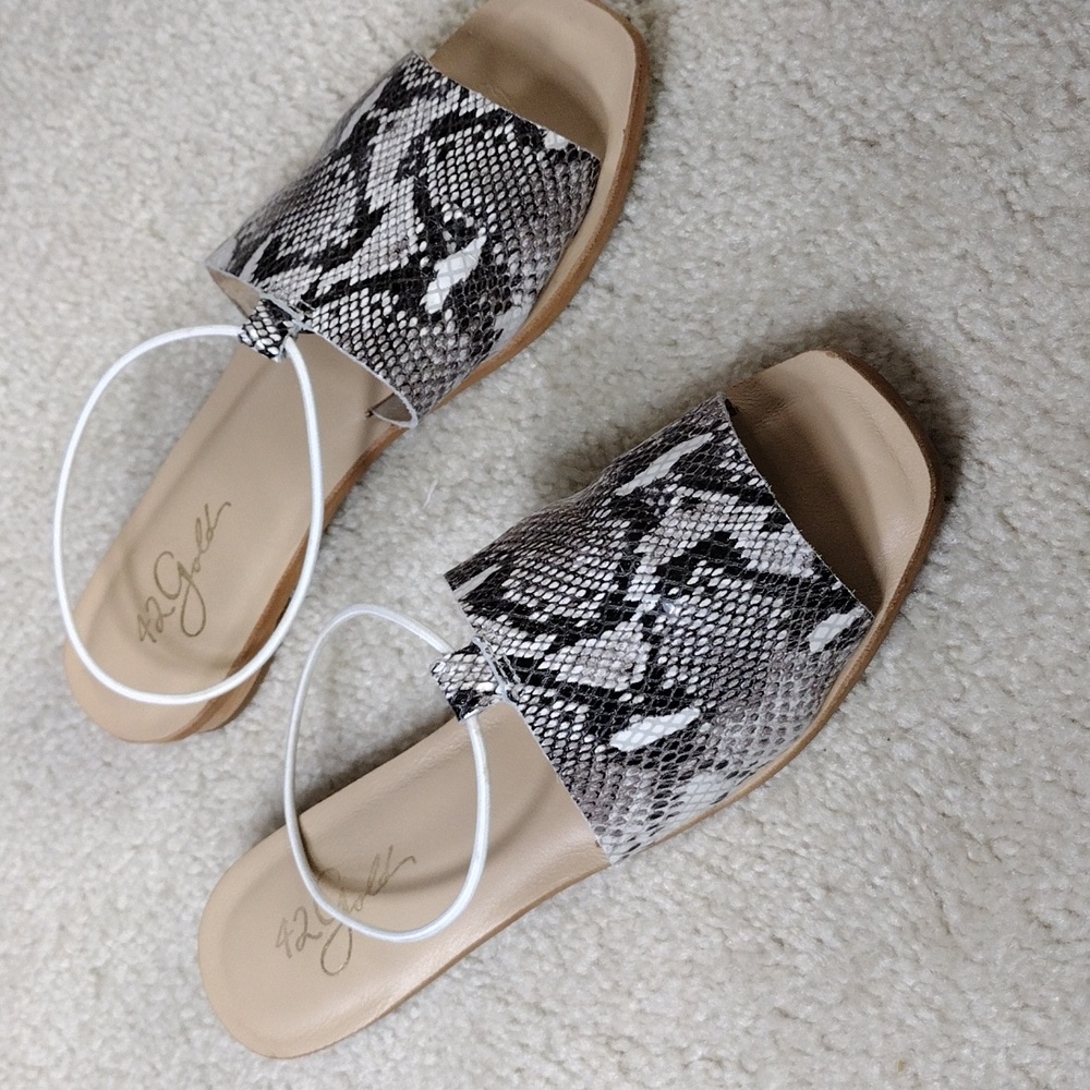 42 Gold gray and white python print leather slides. Size 7